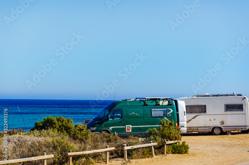 Camper car on beach, camping on seashore