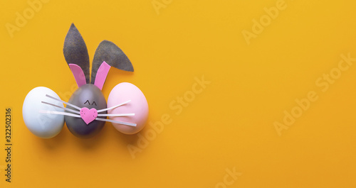 Cute creative photo with easter eggs, some eggs like easter bunny © Mikhaylovskiy 