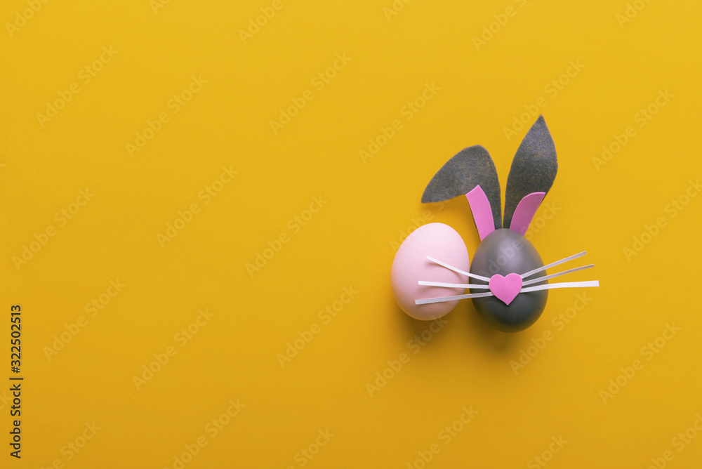 Cute creative photo with easter eggs, some eggs like easter bunny Cute creative photo with easter eggs, some eggs like easter bunny
