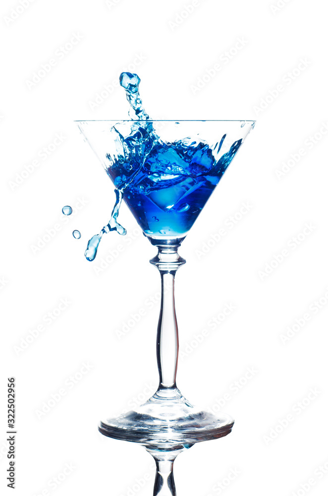 blue cocktail with splash isolated on white blue cocktail with splash isolated on white