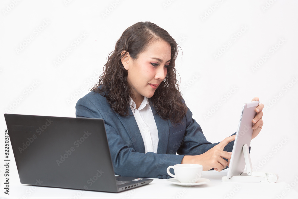 Beautiful young executive with her work and coffee