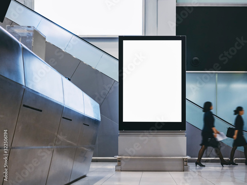 Fototapeta Naklejka Na Ścianę i Meble -  Mock up Banner Signboard stand blank light box Media Advertisement indoor Public building with people