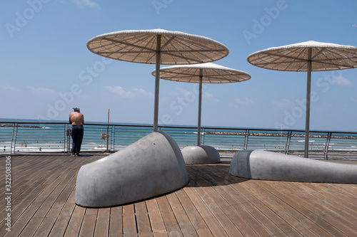 Unidentified man looking at the sea in Tel Aviv beach , Israel