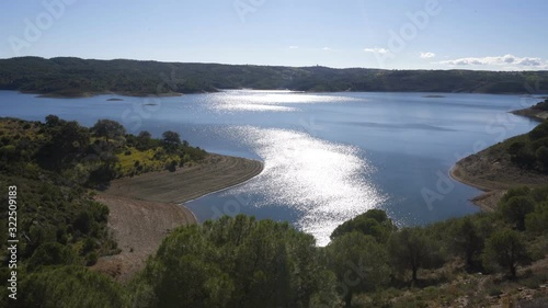 Barragem de Odeleite Dam reservoir in Alentejo, Portugal photo