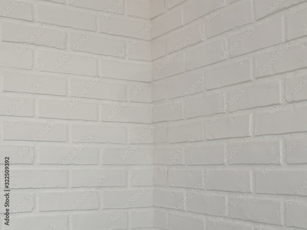 Fototapeta premium Brick wall white stone design texture background