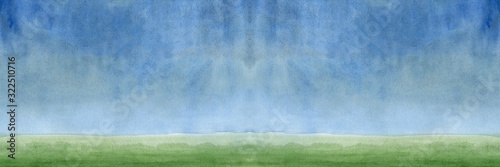 Background in the form of sky and green field, long format, place for an inscription.