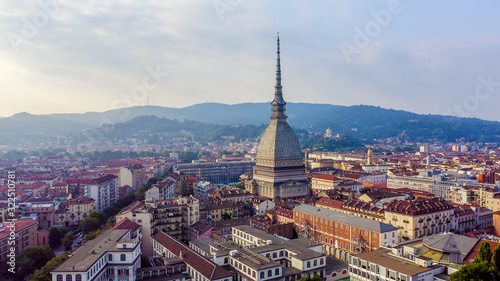 Turin, Italy. Flight over the city. Mole Antonelliana - a 19th-century building with a 121 m high dome and a spire, Aerial View