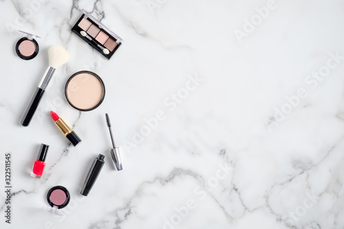 Makeup Brushes on White Marble Background Free Stock Photo