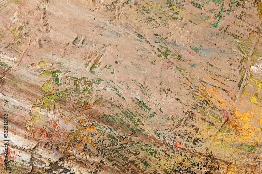 Background image of bright oil-paint palette closeup.