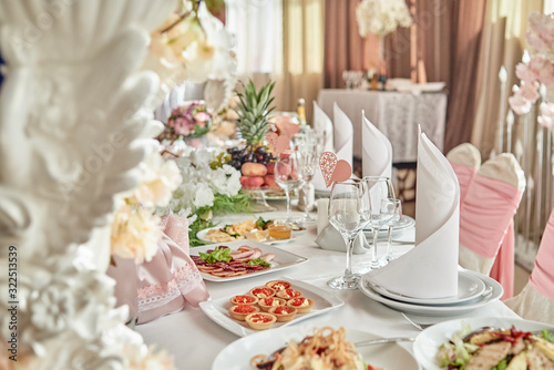 Table set, copy space. Menu mockup, place setting at wedding reception. Table served for wedding banquet in restaurant