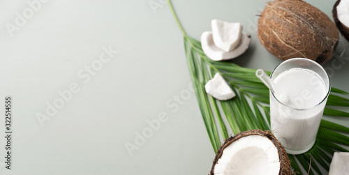 image of fresh half and whole coconuts with coconut non dairy milk