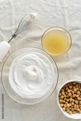 vegan cooking concept, egg replacement , chickpeas whipped liquid (called aquafaba)
