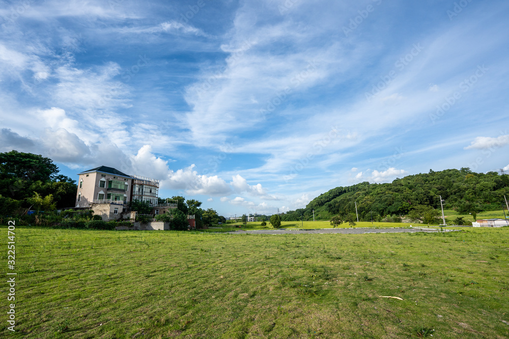 landscape with houses and blue sky landscape with houses and blue sky