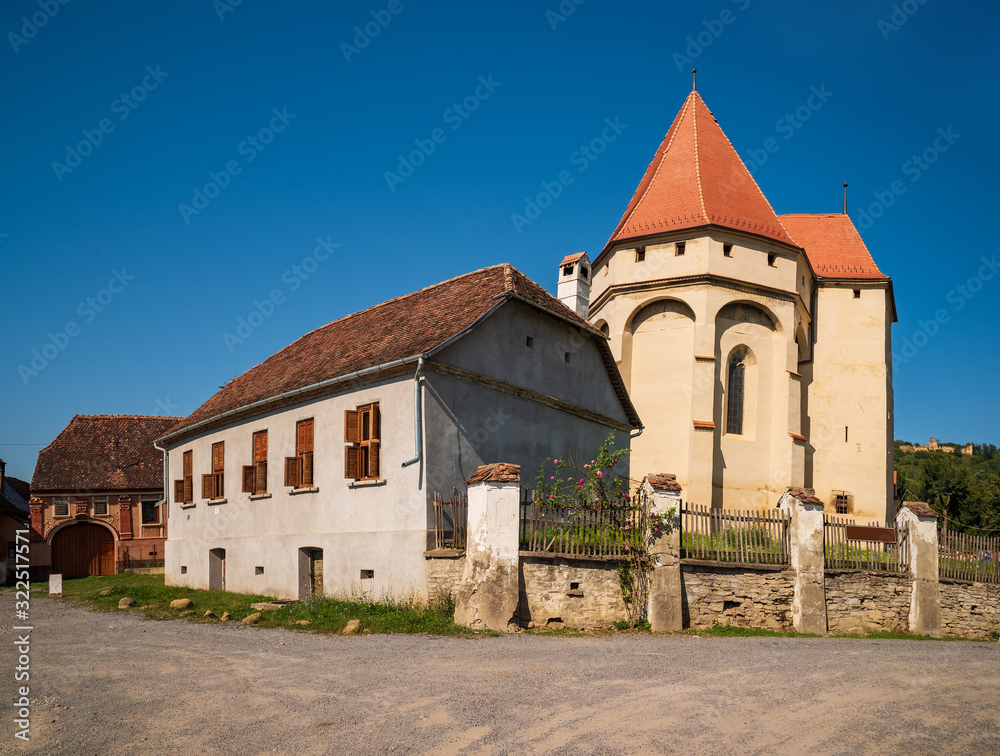 Scenic view of fortified church in Saschiz, Transylvania, Romania. UNESCO World Heritage Site