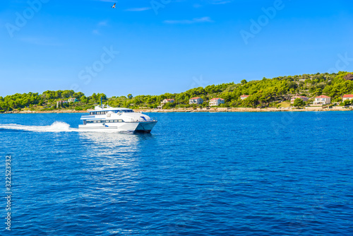 Fototapeta Naklejka Na Ścianę i Meble -  Luxury yacht in the sea cruising on Adriatic Sea blue lagoon, islands Kornati, Dalmatia, Croatia