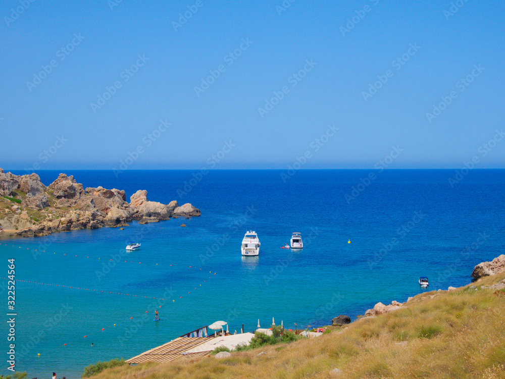 Bay by the Riviera Beach (Ghajn Tuffieha). Malta. Bay by the Riviera Beach (Ghajn Tuffieha). Malta.