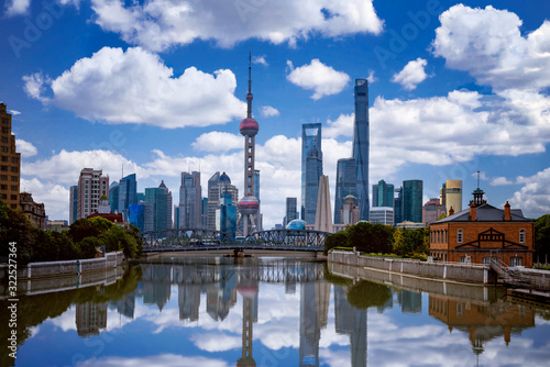 Shanghai skyline with historical Waibaidu bridge