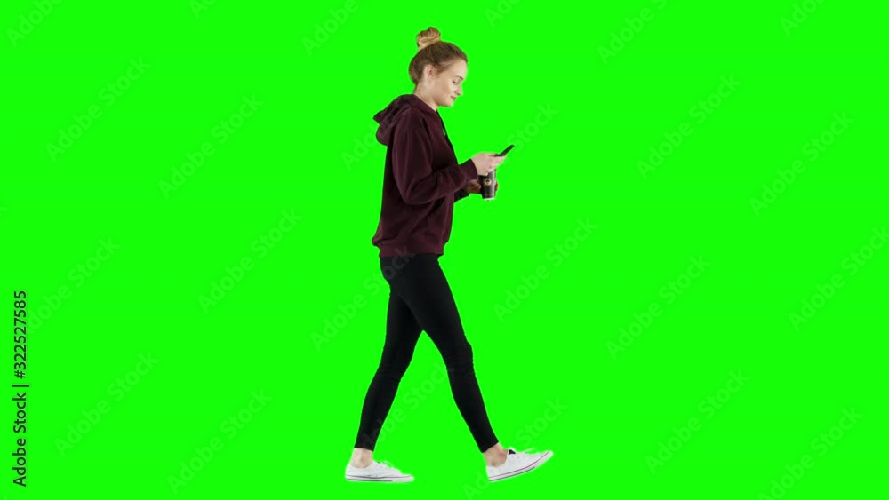 Smiling Brunette Woman Making a Selfie While Walking with Coffee on Green Screen Smiling Brunette Woman Making a Selfie While Walking with Coffee on Green Screen
