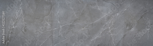 natural gray stone background texture with cracks and veins structure