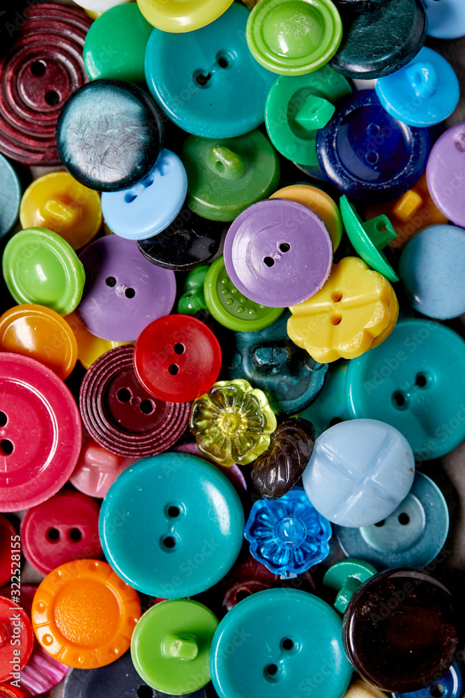 Background and texture of multicolored antique buttons Background and texture of multicolored antique buttons