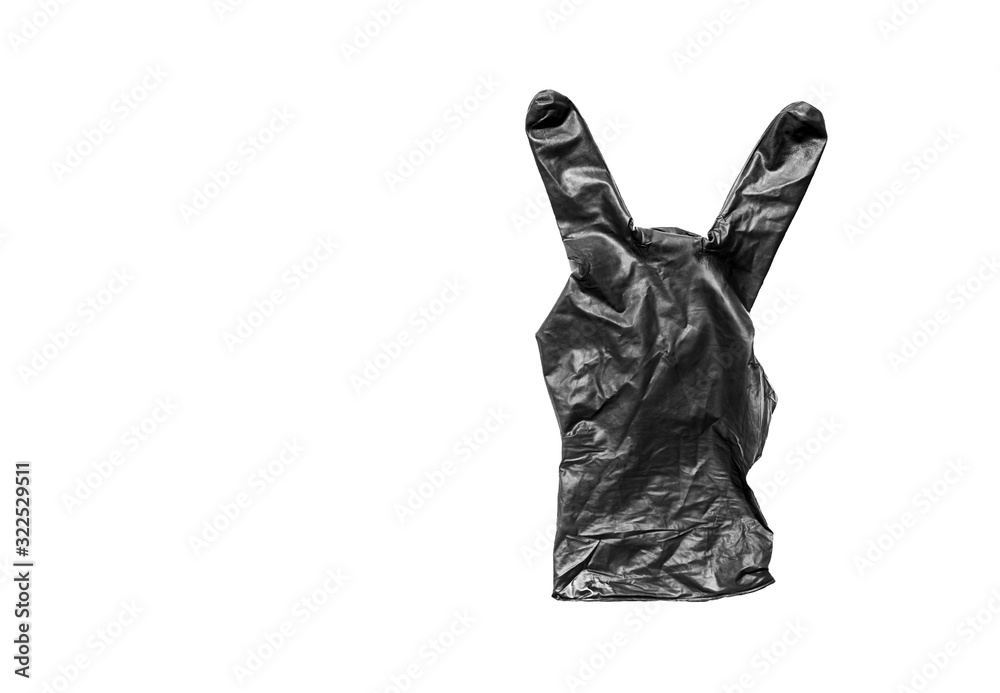 Isolate black rubber glove showing two fingers on white background. Gesture that rocks or horns