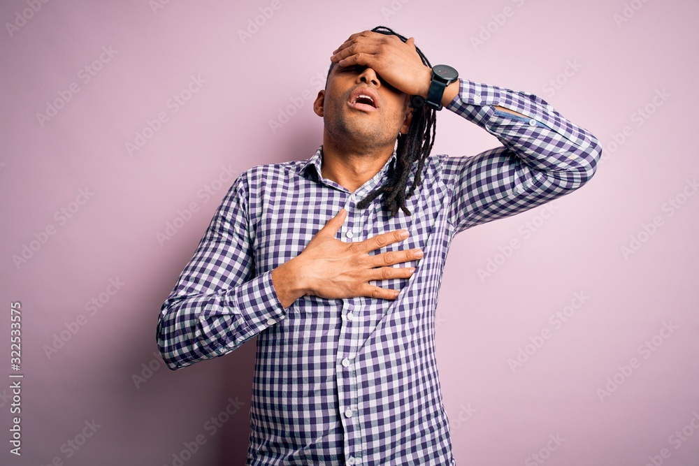 Young handsome african american afro man with dreadlocks wearing casual shirt Touching forehead for illness and fever, flu and cold, virus sick Young handsome african american afro man with dreadlocks wearing casual shirt Touching forehead for illness and fever, flu and cold, virus sick