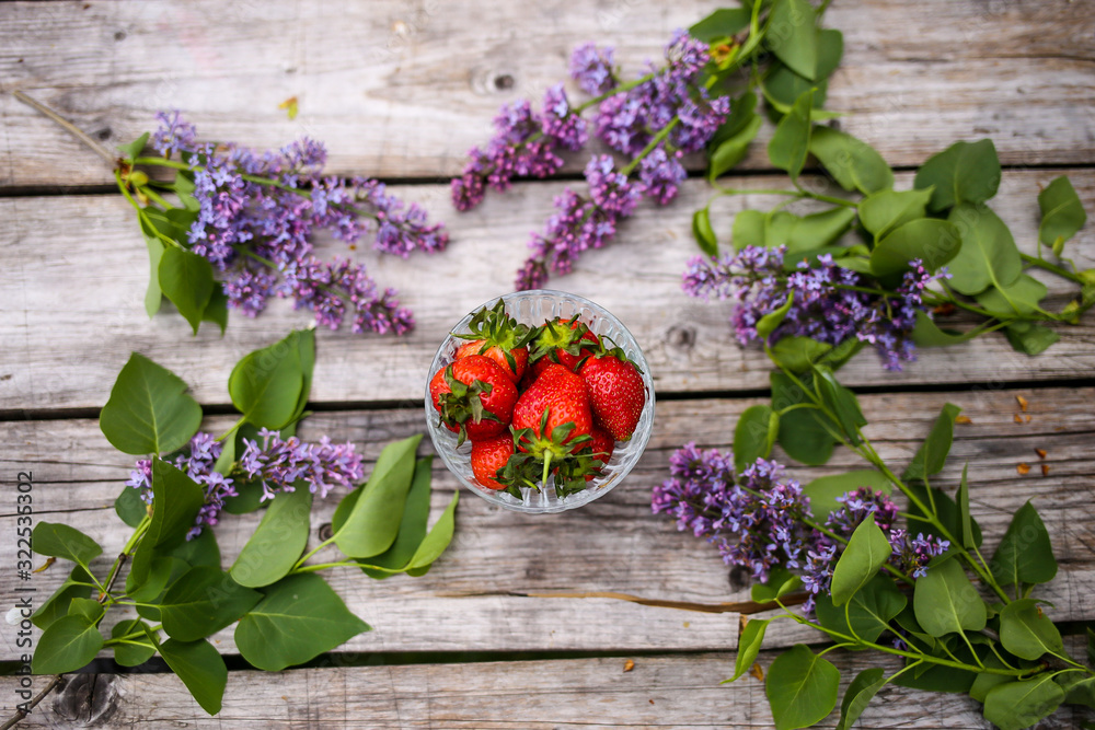 Colorful background with flowers and strawberry Colorful background with flowers and strawberry