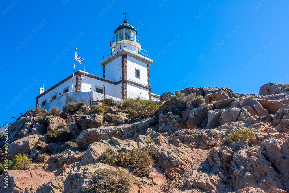Greek Lighthouse on a Sunny Cliff