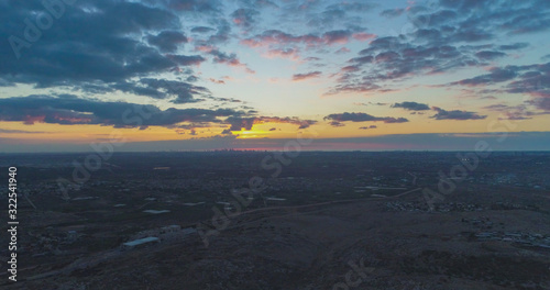 A beautifel panoramic photo of sunrise on the vally. Dramatic clouds. The sun rays.