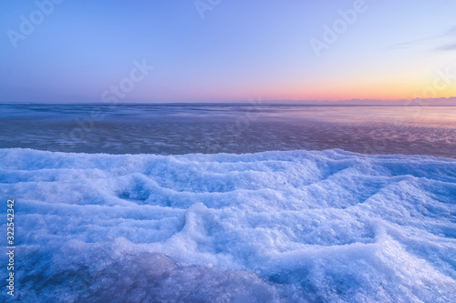 winter beach dawn time / bright winter landscape