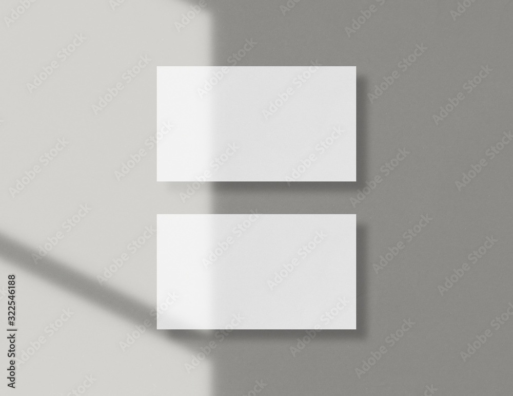 Mockup of two horizontal business cards. Mockup scene. Top view. Photo mockup with clipping path. Modern template for branding identity. Mockup of two horizontal business cards. Mockup scene. Top view. Photo mockup with clipping path. Modern template for branding identity.