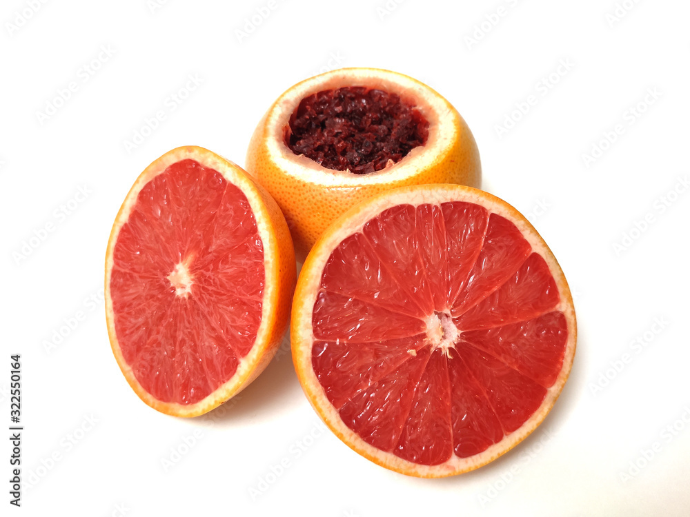 Flavored Hookah bowl of grapefruit with tobacco isolated on white background. Flavored Hookah bowl of grapefruit with tobacco isolated on white background.
