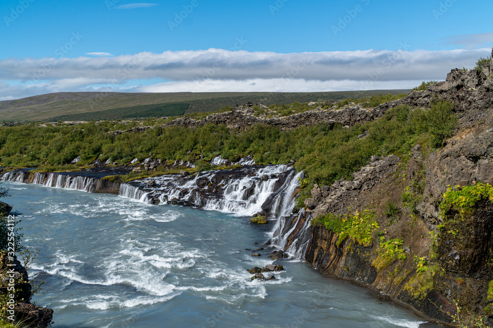 Small waterfall in Iceland – Hraunfossar – on a sunny day