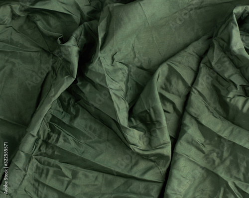 green satin textile fabric, piece of fabric for sewing curtains and things