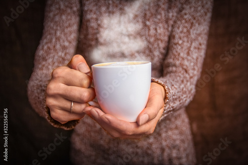 a female hands and coffee