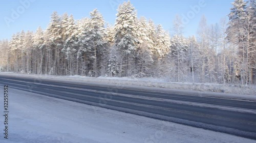  Traffic, truck on winter road on frosty day, Beautiful winter landscape