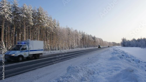   Traffic, truck on winter road on frosty day, Beautiful winter landscape