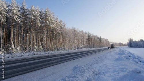  Traffic, truck on winter road on frosty day, Beautiful winter landscape