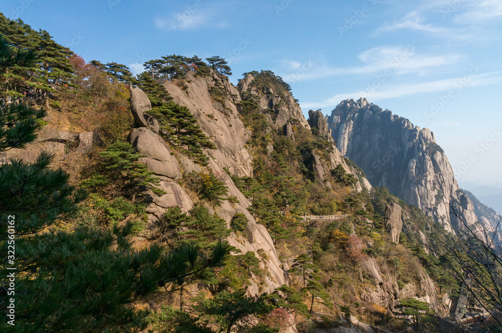 Oddly-shaped rocks on a foggy day, Huangshan Mountain in China.