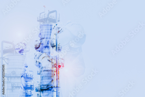 Double exposure oil refinery Industry worker at the factory welding close up on structure oil refinery plant, powerplant background.