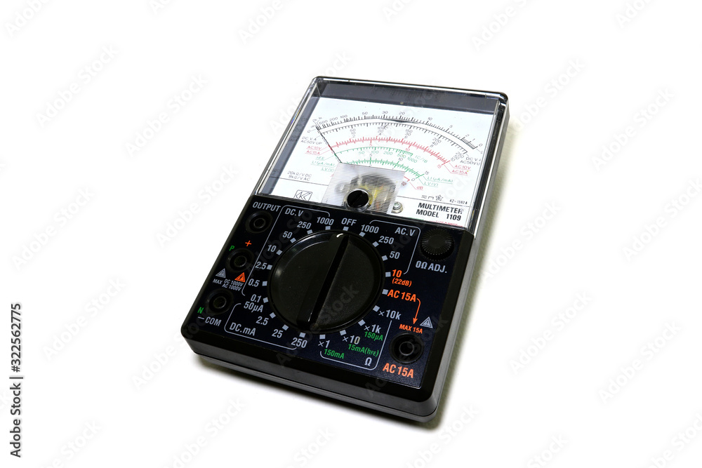 Analog black multimeter Laying on a white background. Lumphun Thailand : 24 January 2019 Analog black multimeter Laying on a white background. Lumphun Thailand : 24 January 2019