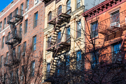 Colorful Old Buildings in Greenwich Village New York with Fire Escapes