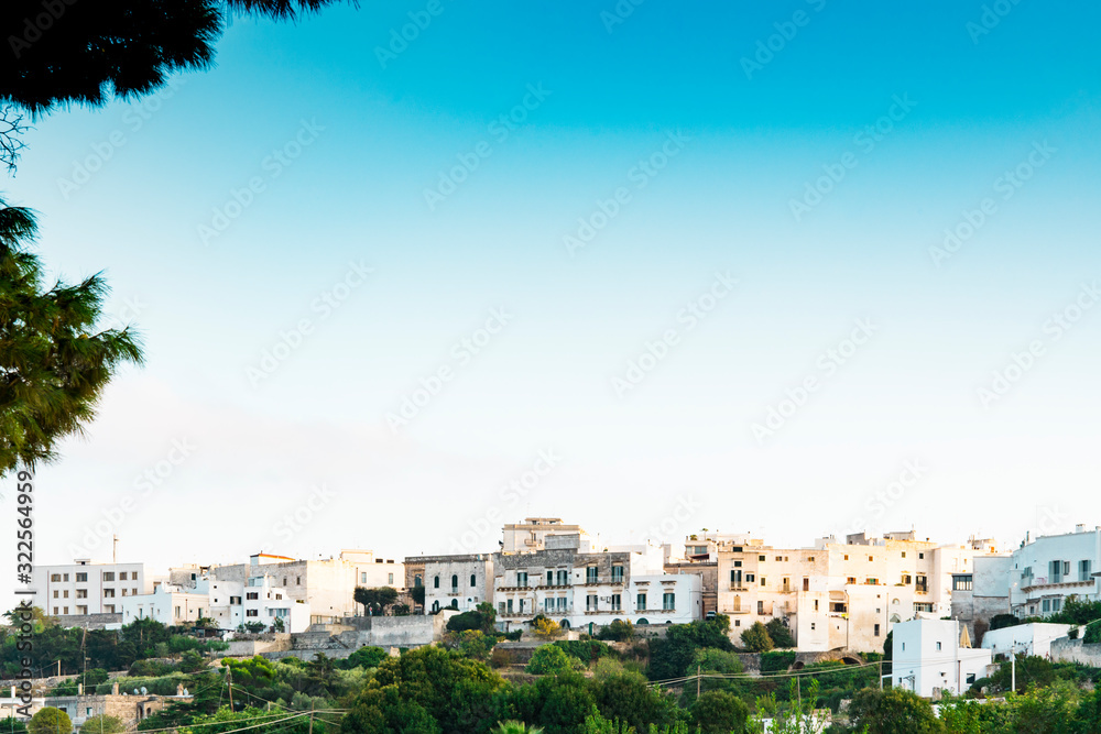 white houses of Ostuni on hill. Italy