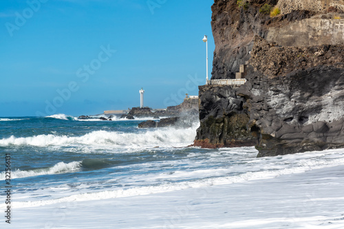 Black lava sand beach in Puerto Naos, La Palma, Canarian islands, Spain photo