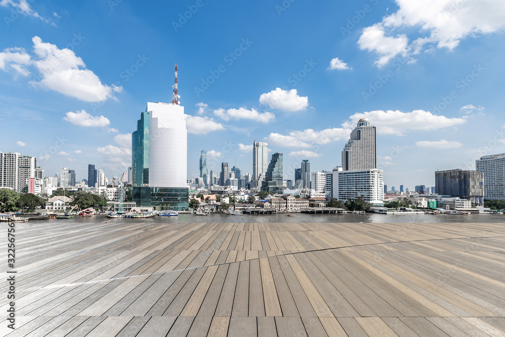 Background material of city and ground synthesis under blue sky and white clouds