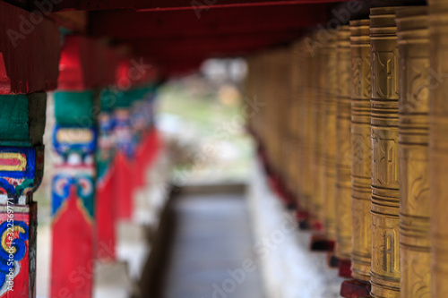Tibetan prayer wheels with shallow depth of field © Gil K
