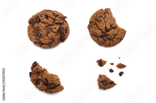 Chocolate chip cookies with some broken and crumbs isolated on white background in Top view.