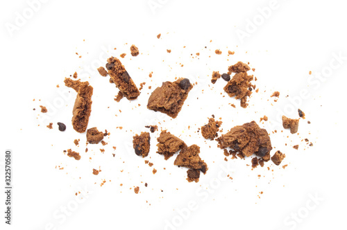 Cookies broken and crumbs of chocolate chip flavored isolated on white background.