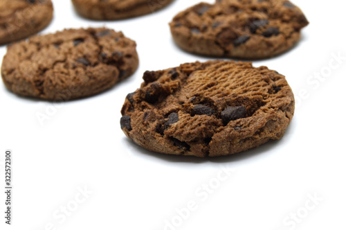 Chocolate chip cookies crunchy delicious sweet meal and useful biscuits isolated on white background. Homemade pastry.