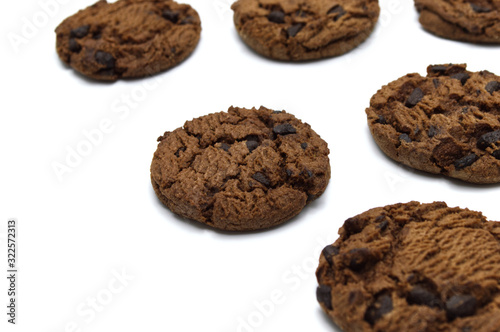 Chocolate chip cookies crunchy delicious sweet meal and useful biscuits isolated on white background. Homemade pastry.